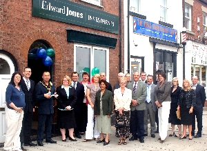 CELEBRATIONS AS ANDREWS NEW STOCKBROKING BUSINESS IS OPENED  Front left to right, Karen Harrington, wife 