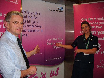 Dr Andrew Kent with Specialist Nurse Laurence Frys at Southport Hospital, outside the ground floor lift