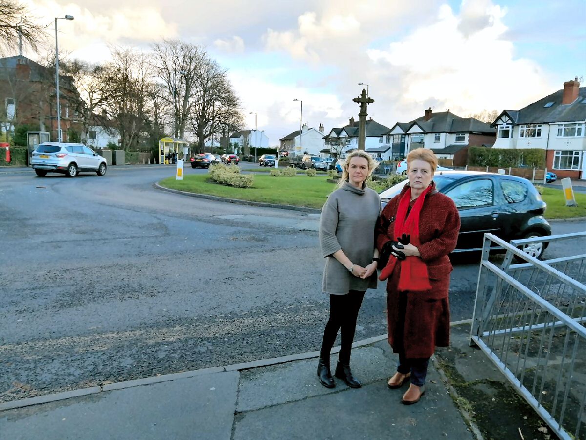 Cllr Nina Killen (left) and Cllr Catie Page at the Cross House roundabout in Formby.