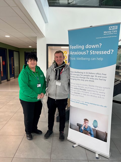 Steven Simpson (right), from Mersey Care's Talking Therapies service, with Jeanine Williams from St Helens college.