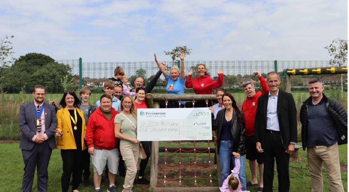 Hudson Primary, (Bill Esterson;  Sefton Central MP, Niki Craddock, Headteacher of Hudson Primary School, Sean Eames;  Head of External Affairs Persimmon Homes, Maria O'Connor;  Parent at Hudson Primary School, alongside pupils and parents of Hudson Primary School.)