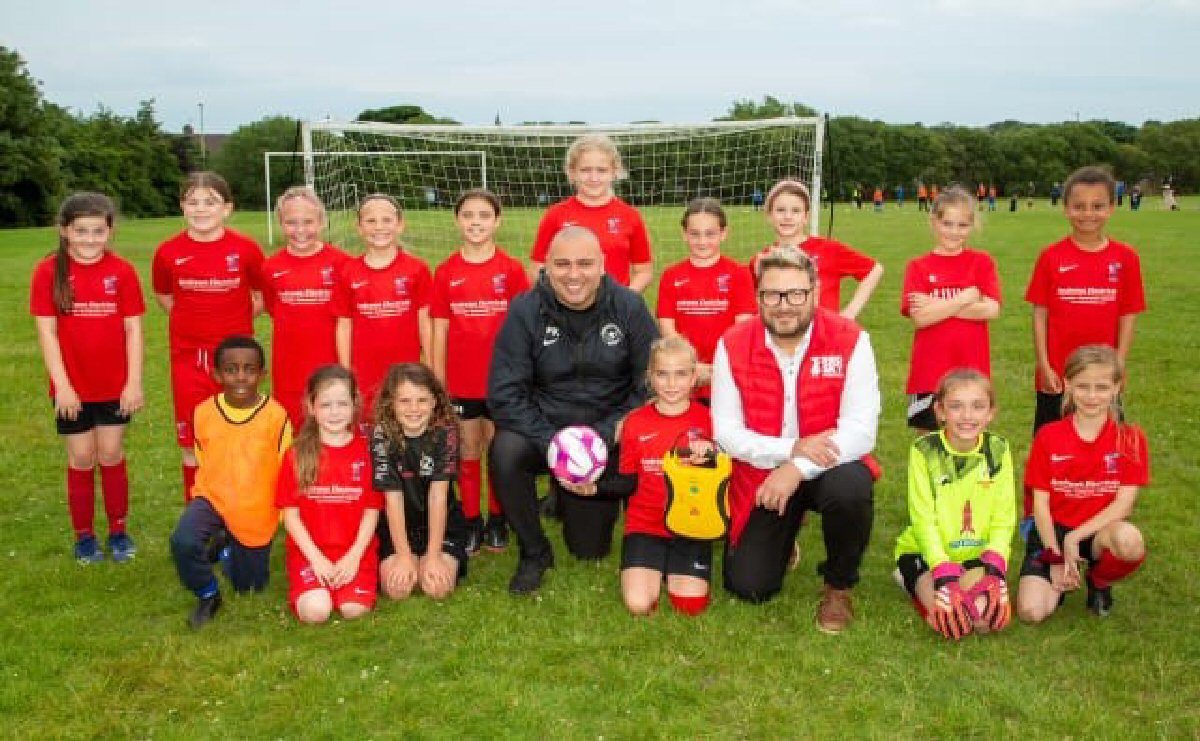 Red Sky Foundation's Sergio Petrucci, Co-founder, and Team Grassroots Founder Paul Kirton join Luna, the daughter of the foundation founder and teammates at the famous Boldon Girls FC in South Shields.