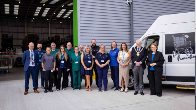 Richard Kemp CBE, the Lord Mayor of Liverpool, and Rosie Cooper, Mersey Care's chair (far right) with members of the Community Equipment Service.