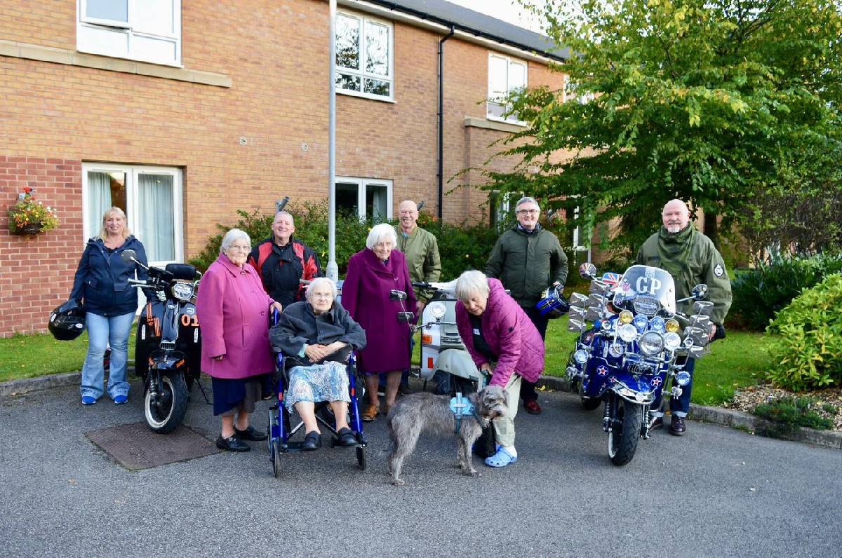 Residents and the Scooter Club.