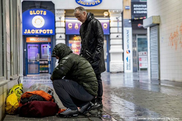 The Councils outreach team on the streets encouraging a rough sleeper indoors.