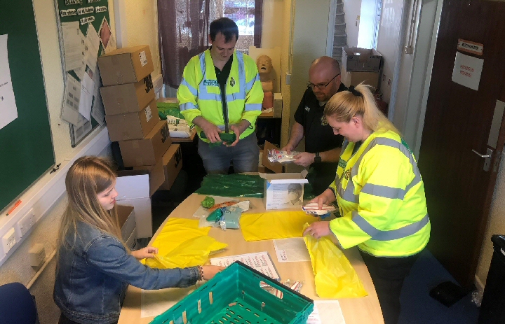 Volunteers in South Lancashire support with packing personal protective equipment